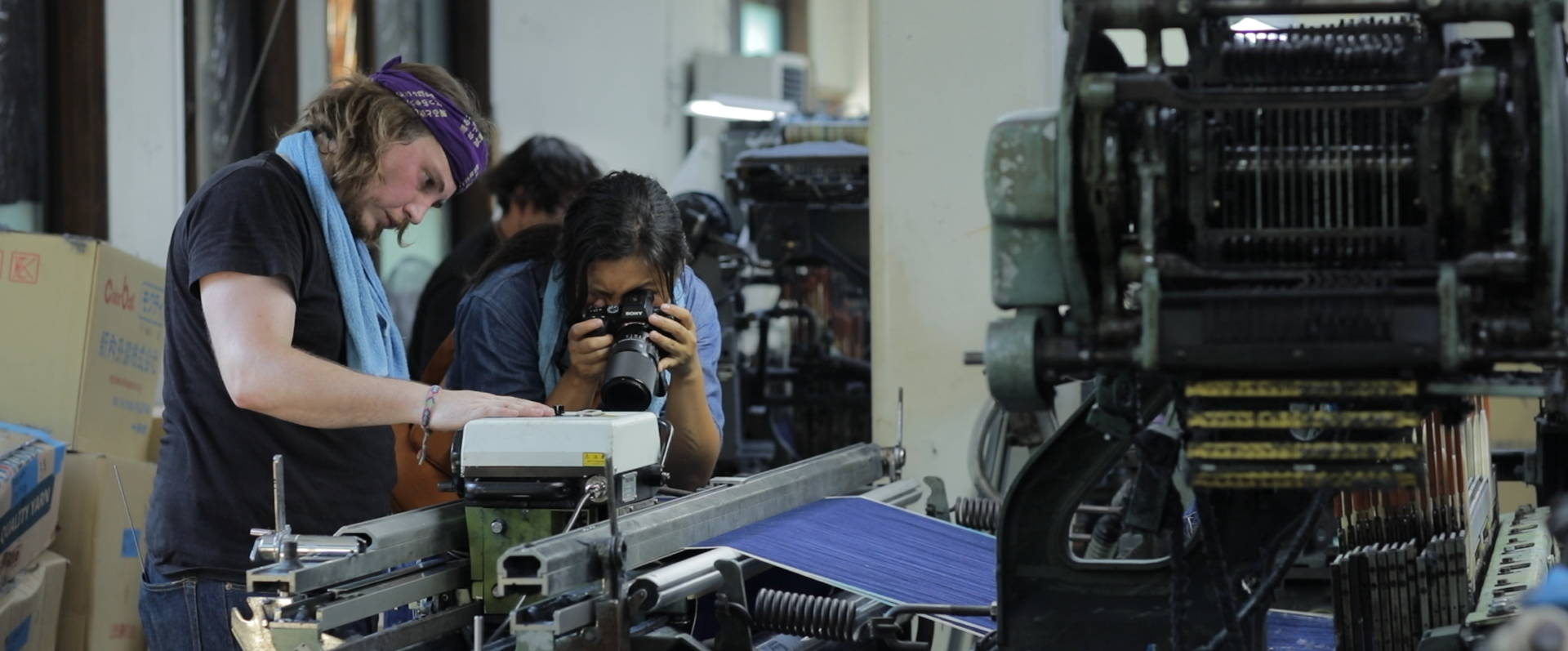Jiawa Liu filming Arthur Leclercq at the weaving mill