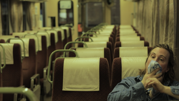 Film still — Arthur on the train